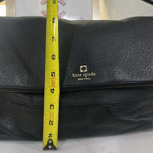Kate spade everyday purse black leather with removable strap.